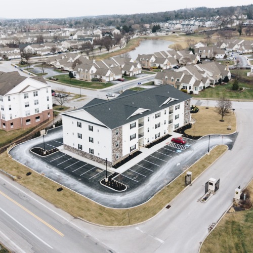 a building with landscaping