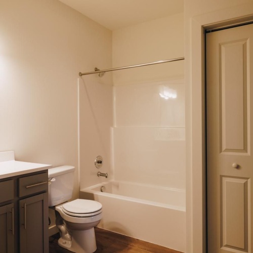 a bathroom with a toilet and sink